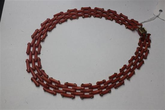 A gold and coral gate link choker necklace, 37cm.